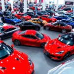 Explore the excitement of the Auto Cars Show with modern cars showcased in a lively atmosphere.