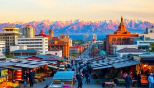 Discover the vibrant cityscape of Almaty at sunset at https://albmaftoh.com with mountains in the background.